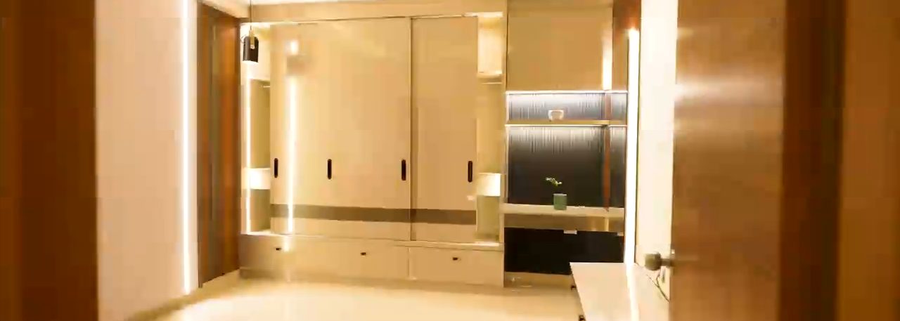Sample apartment bedroom with wardrobe